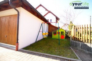 Eigentumswohnung_Buchloe_AußenSpielplatzoderStellplatz
